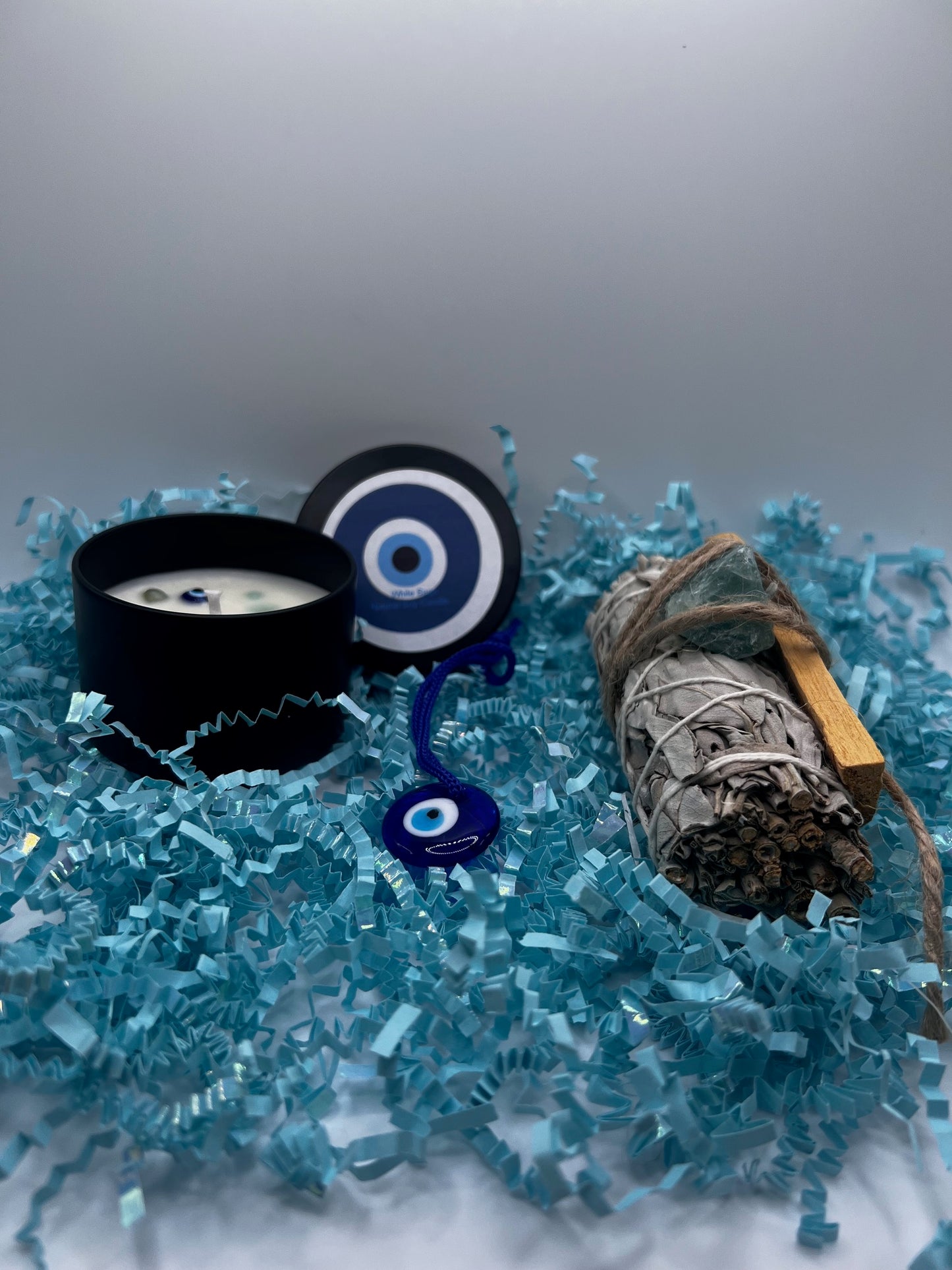 4oz blue evil eye candle w/sage/palosanto/greencrystal/Pendant