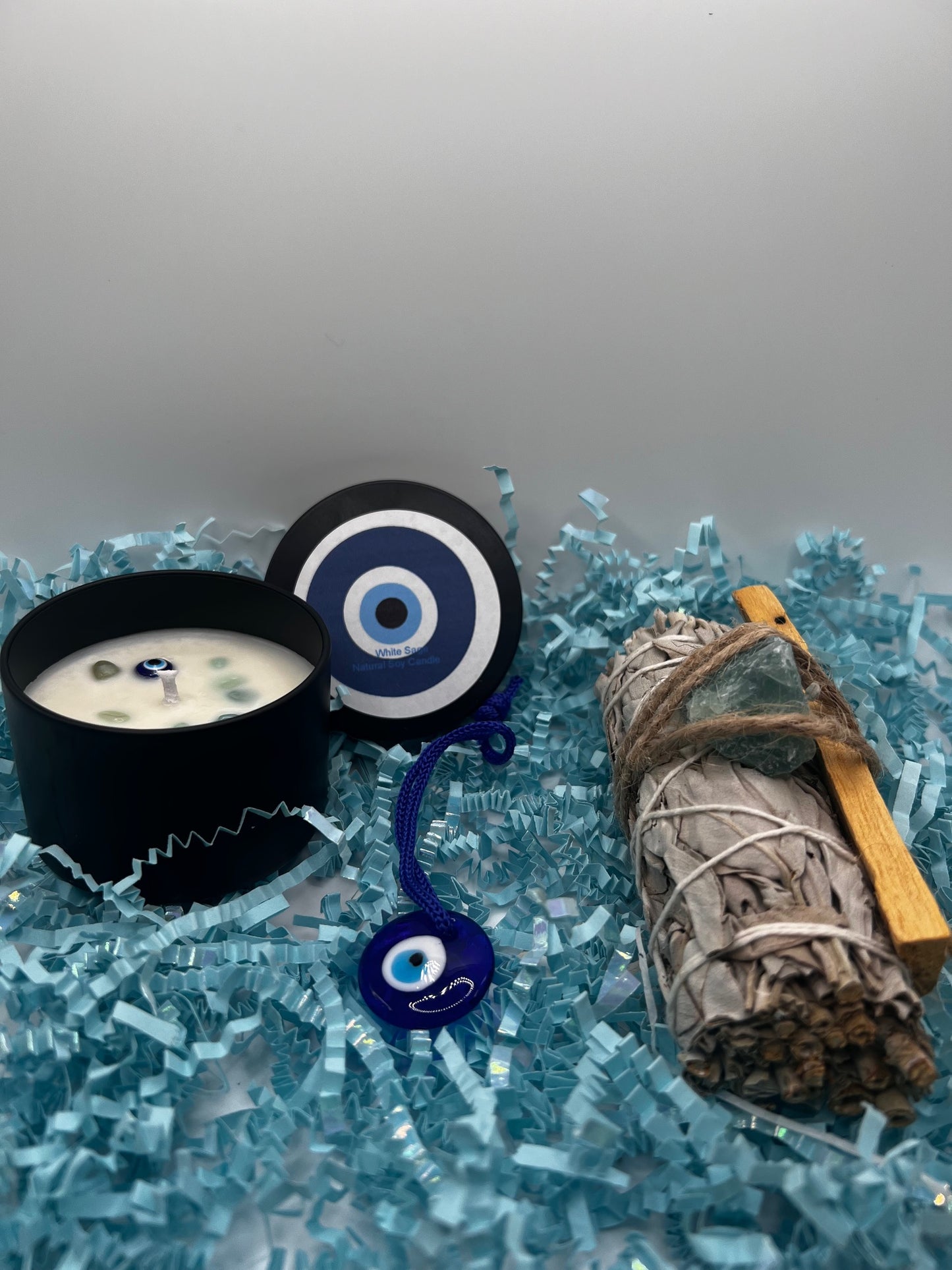 4oz blue evil eye candle w/sage/palosanto/greencrystal/Pendant