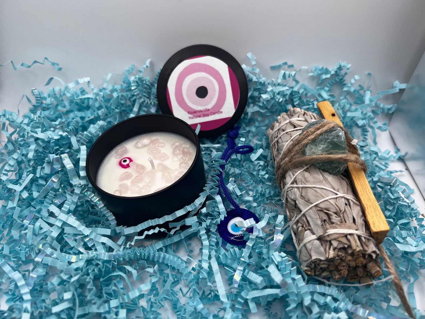 4 oz pink evil eye candle w/sage/palosanto/greencrystal/Pendant